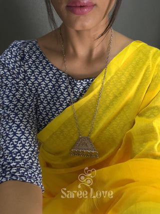 Yellow Saree With Blue Printed Blouse