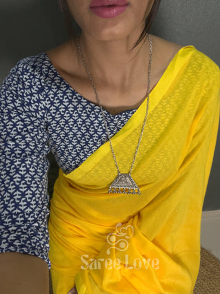 Yellow Saree With Blue Printed Blouse