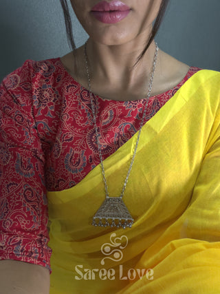 Yellow Saree With Red Printed Blouse