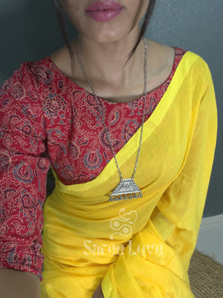 Yellow Saree With Red Printed Blouse