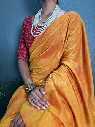 Orange Saree With Red Printed Blouse