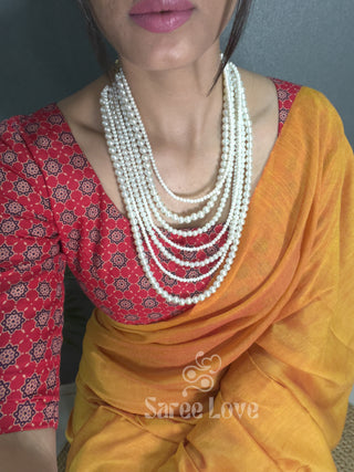 Orange Saree With Red Printed Blouse