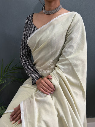 Off White Saree With Black Printed Blouse